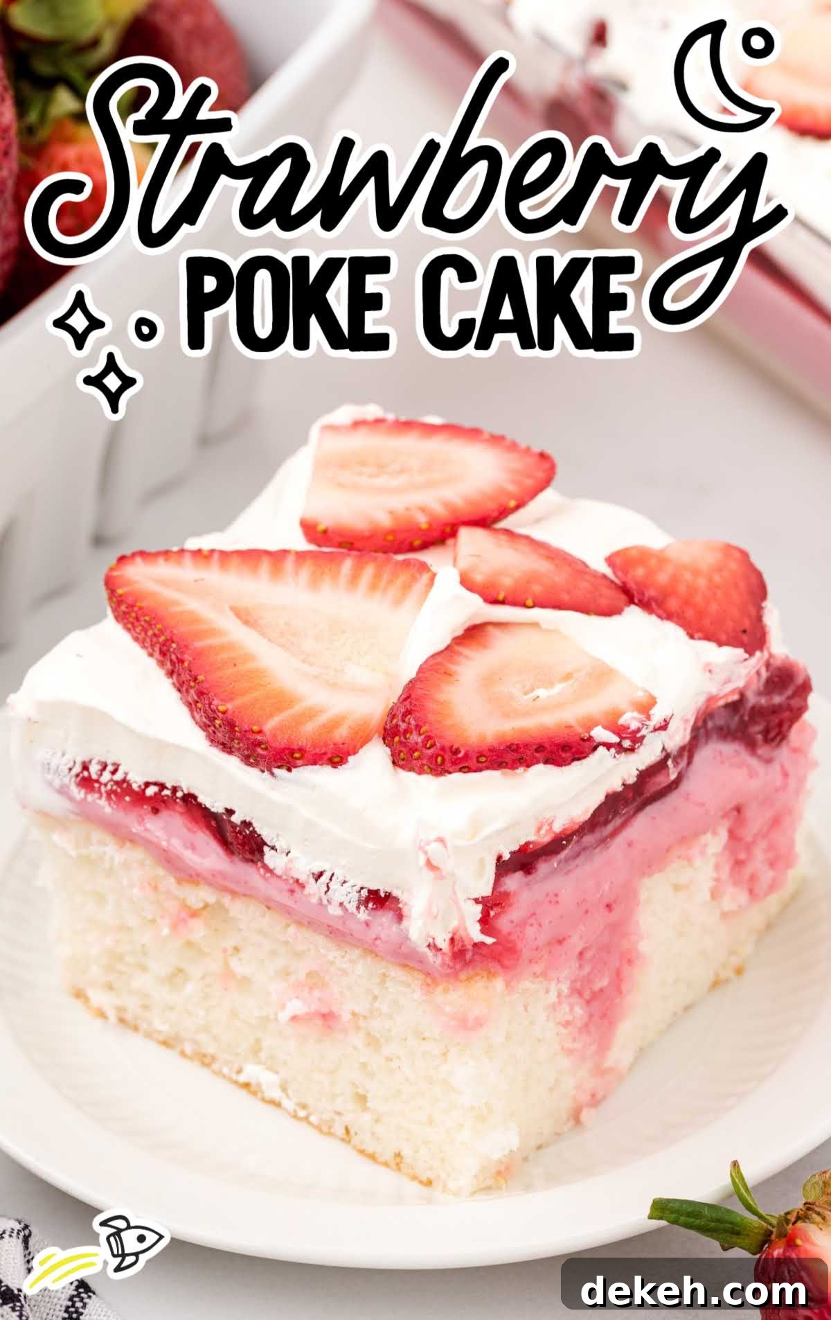strawberry poke cake topped with whipped topping and sliced fresh strawberries