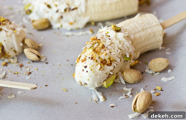 Hand holding a Banana Crunch Pop