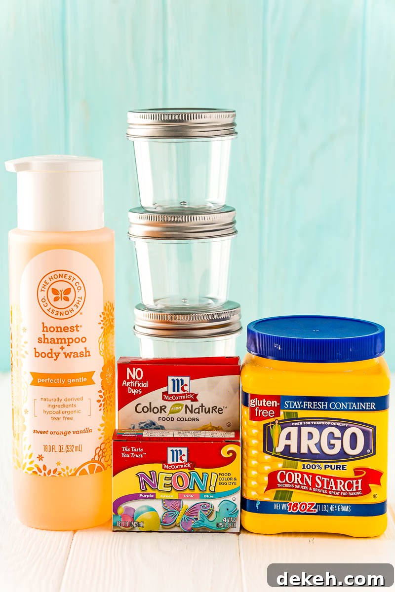 Ingredients to make kids bath paint on a white table.