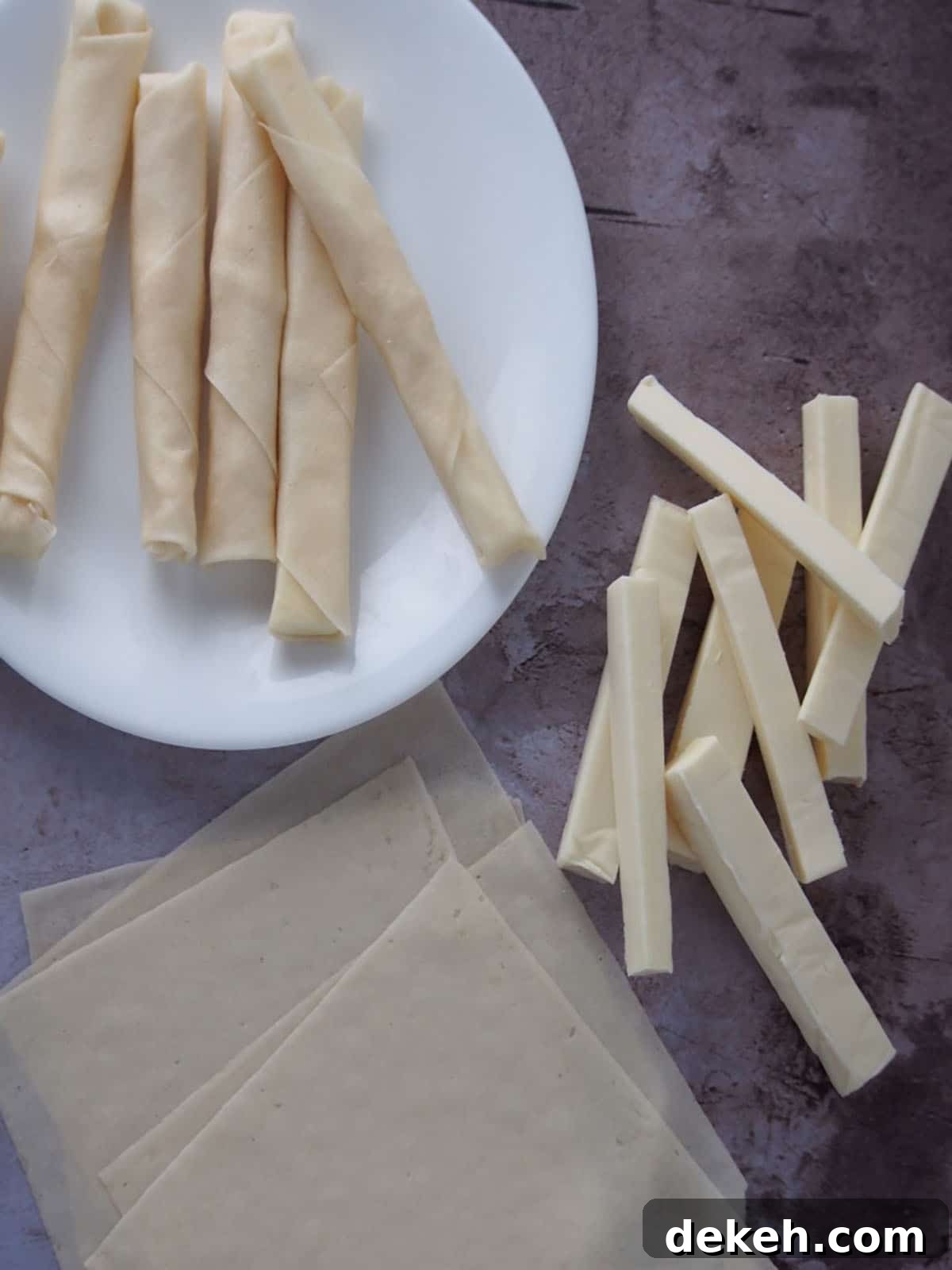 Eden cheese cut into sticks, spring roll wrappers