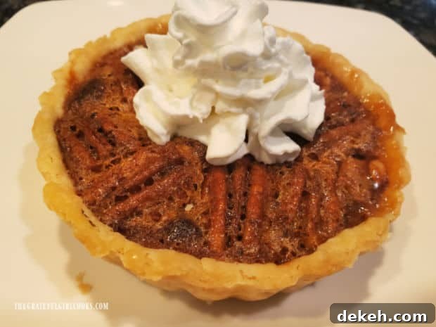 Served little pecan pies with whipped cream