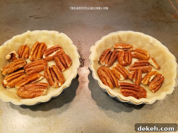 Pecans arranged in crust