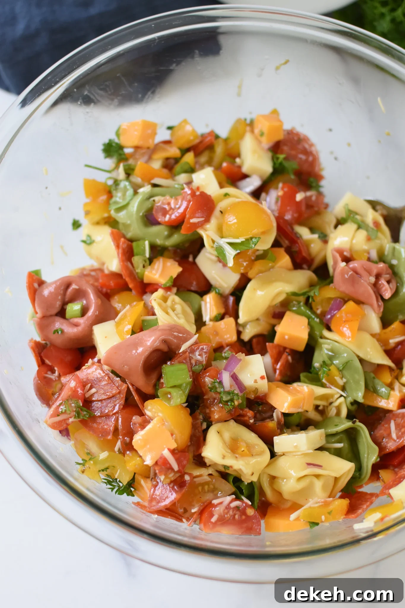 Italian Tortellini Salad in a clear bowl.