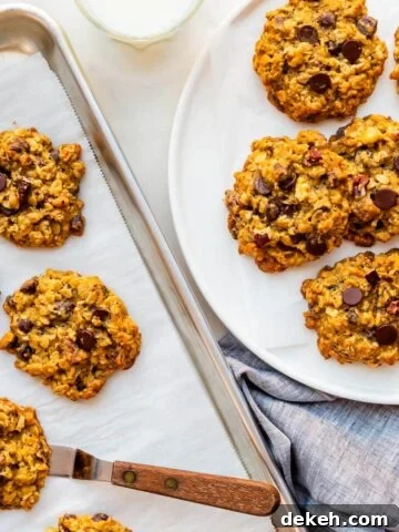 Transferring baked banana oatmeal cookies to a plate to serve them.