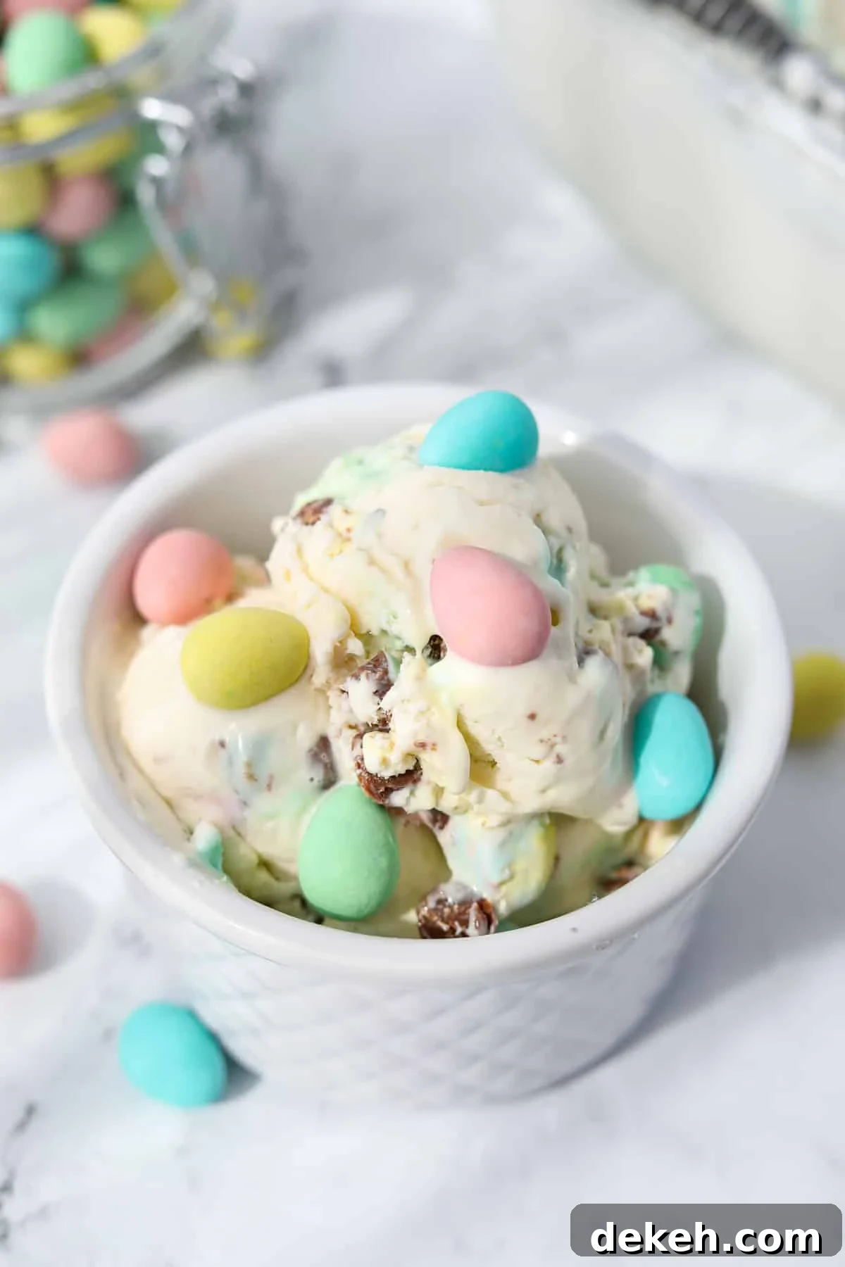 A bowl of mini egg ice cream topped with mini eggs.