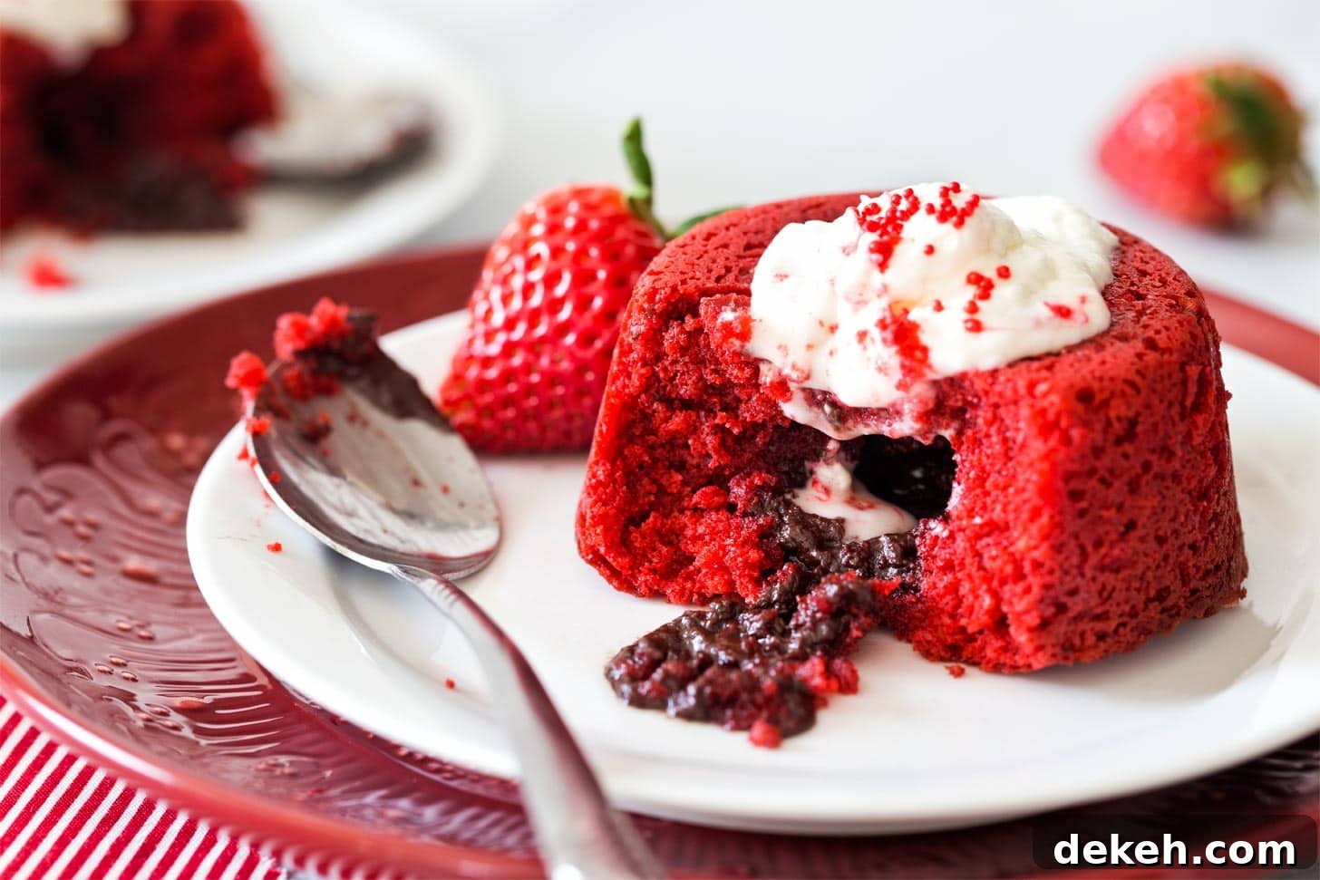 Red Velvet Molten Cake with spoon on white plate