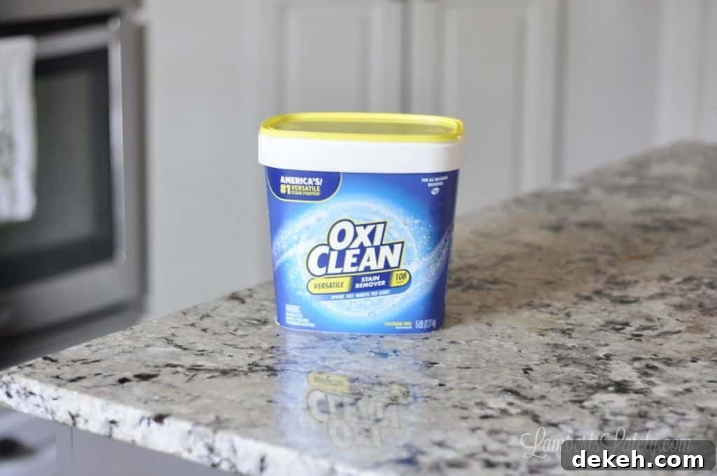 tub of oxi clean on a counter.