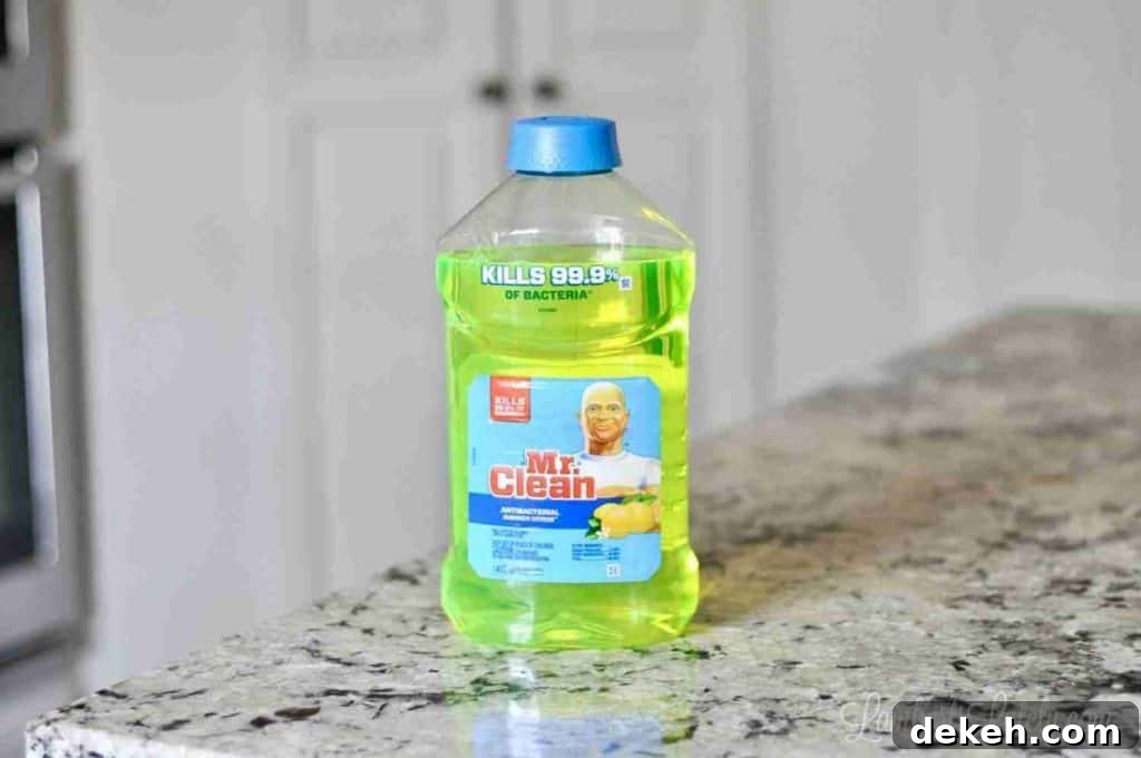 bottle of yellow mr clean on a counter.