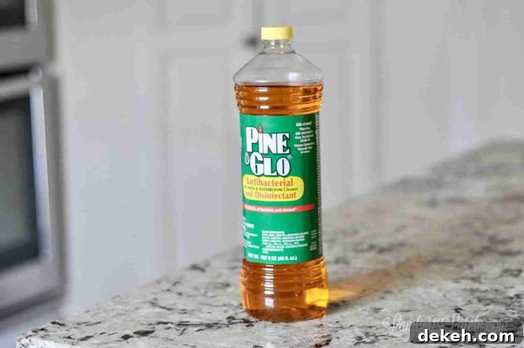 bottle of pine sol on a counter.