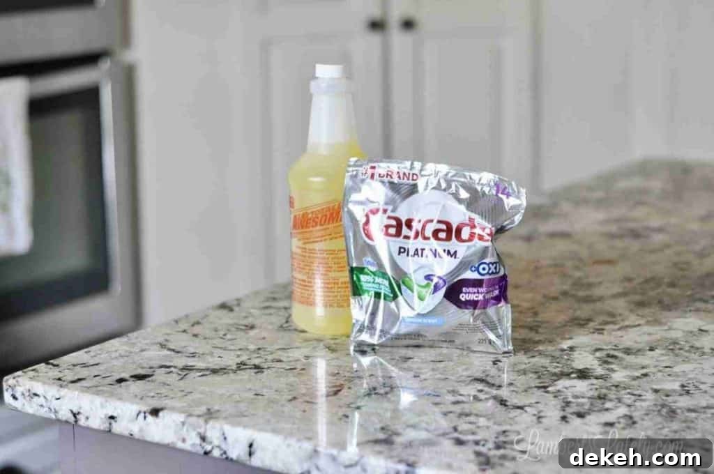 totally awesome cleaner and a pack of cascade dish tabs on a counter.