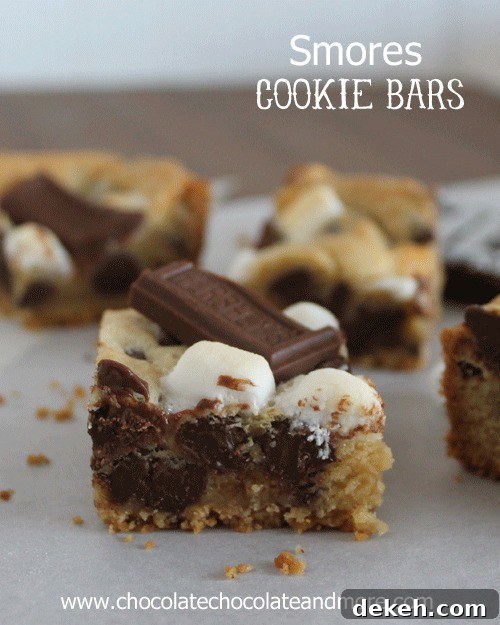 Smores Cookie Bars. Graham Cracker, Hershey's Chocolate and marshmallow wrapped up neatly in a bar.