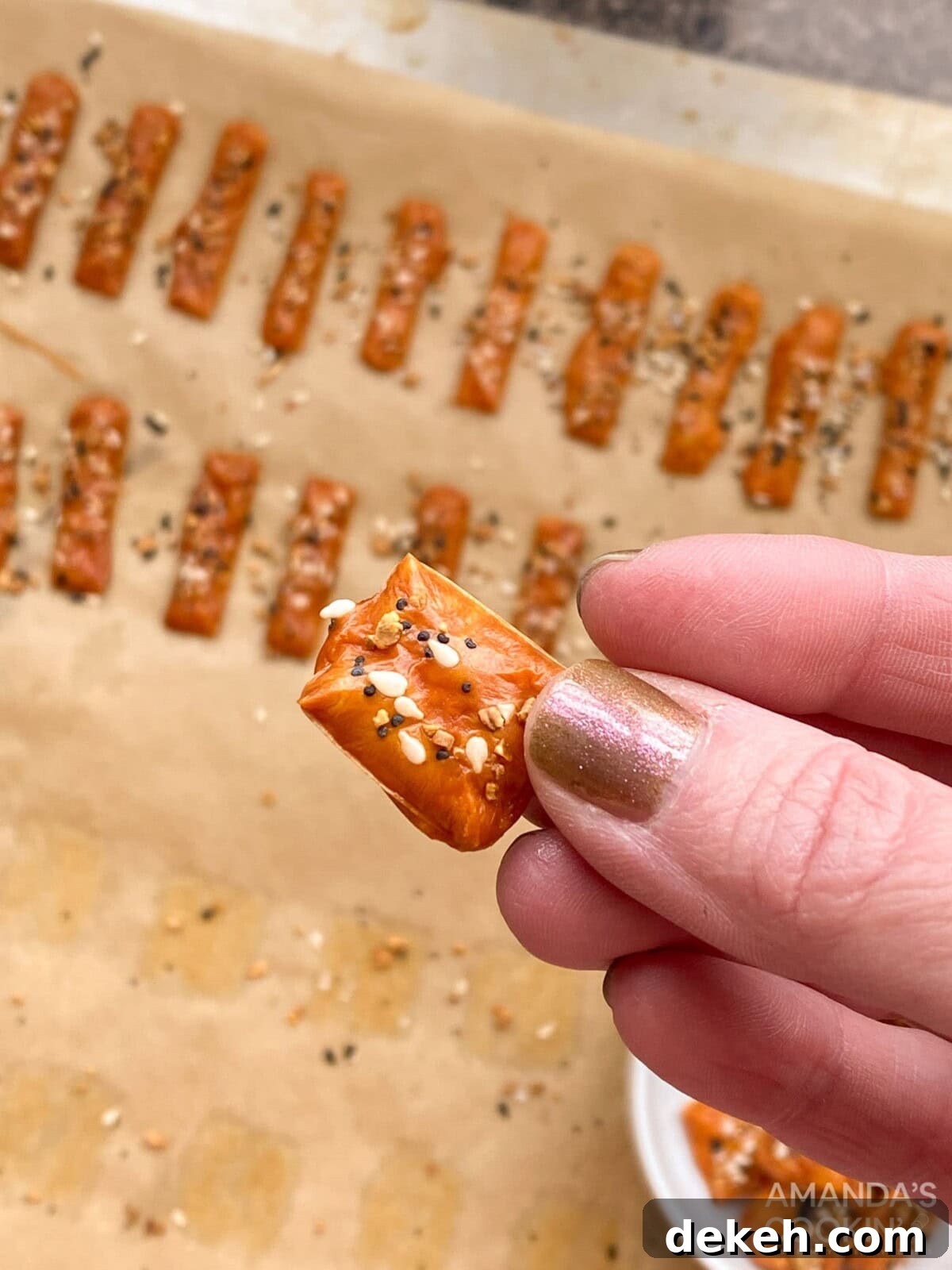 holding a keto cheese cracker