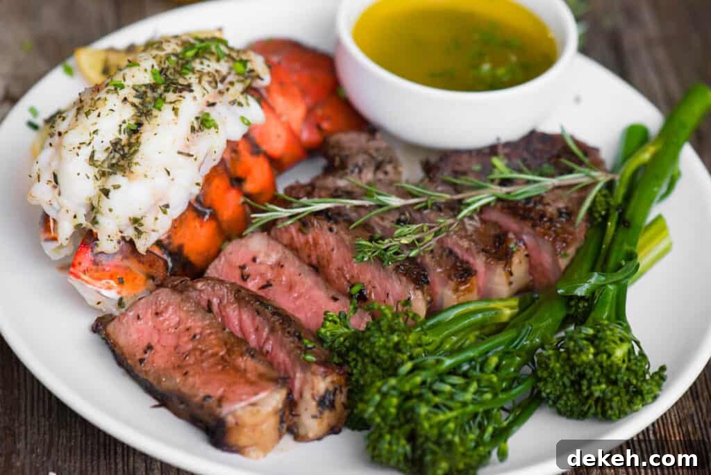 sliced steak and broiled lobster tail