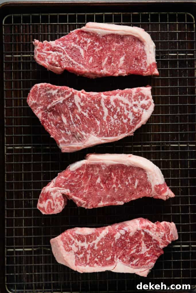 marbled New York Strip Steaks