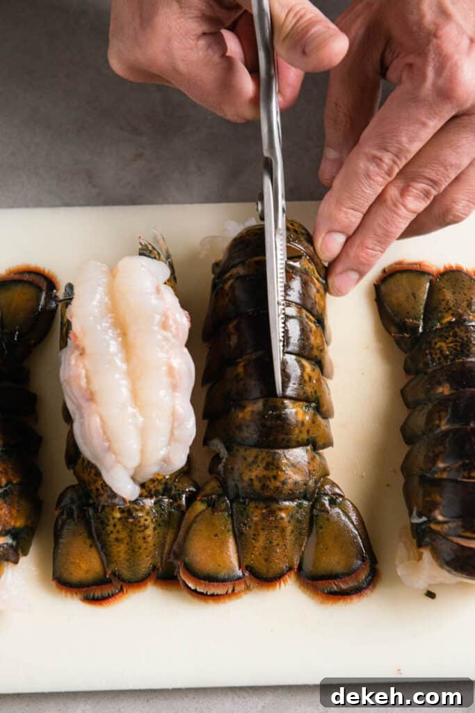 cutting lobster tail with scissors