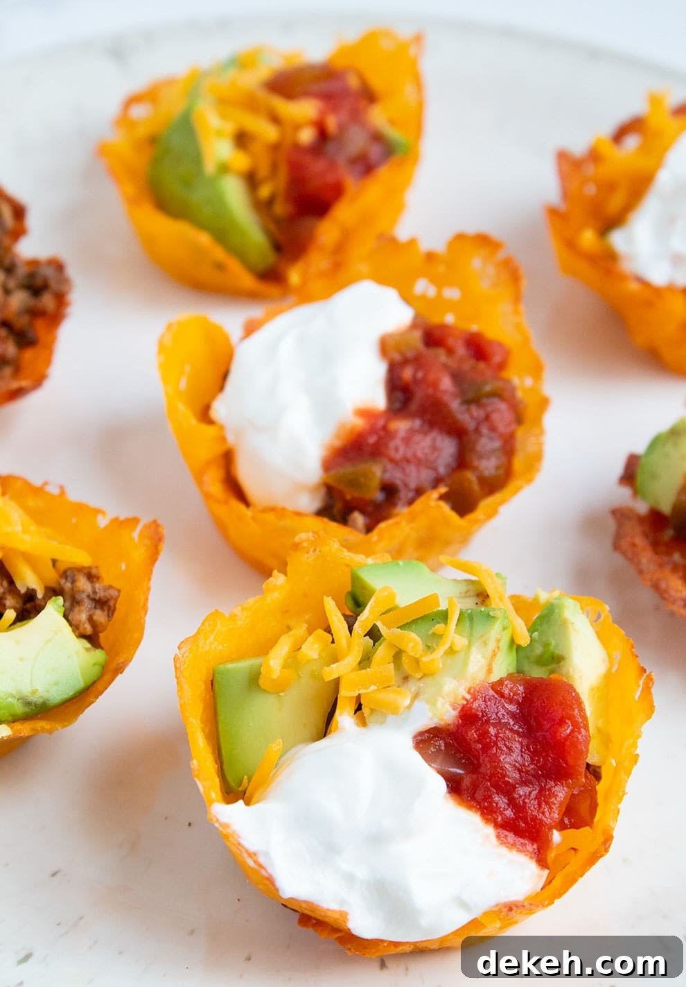 tray of keto taco cups with various fillings