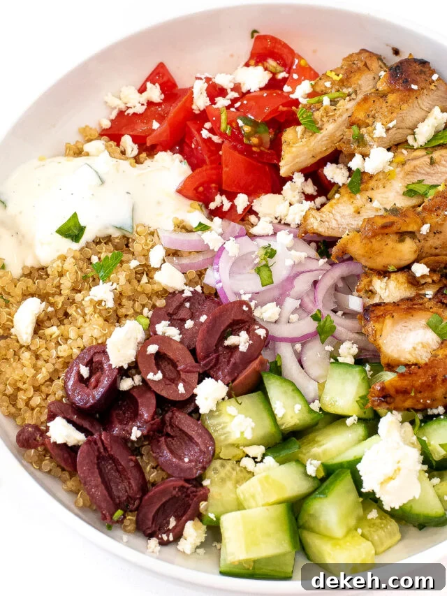 Greek chicken bowl in a white bowl. 