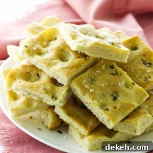 Plate of focaccia bread and pink napkin