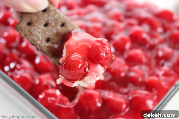 Cherry Cheesecake Dip - Just 4 Ingredients. Makes for a perfect appetizer. Serve them with graham crackers, Nilla wafers, or even pretzels.