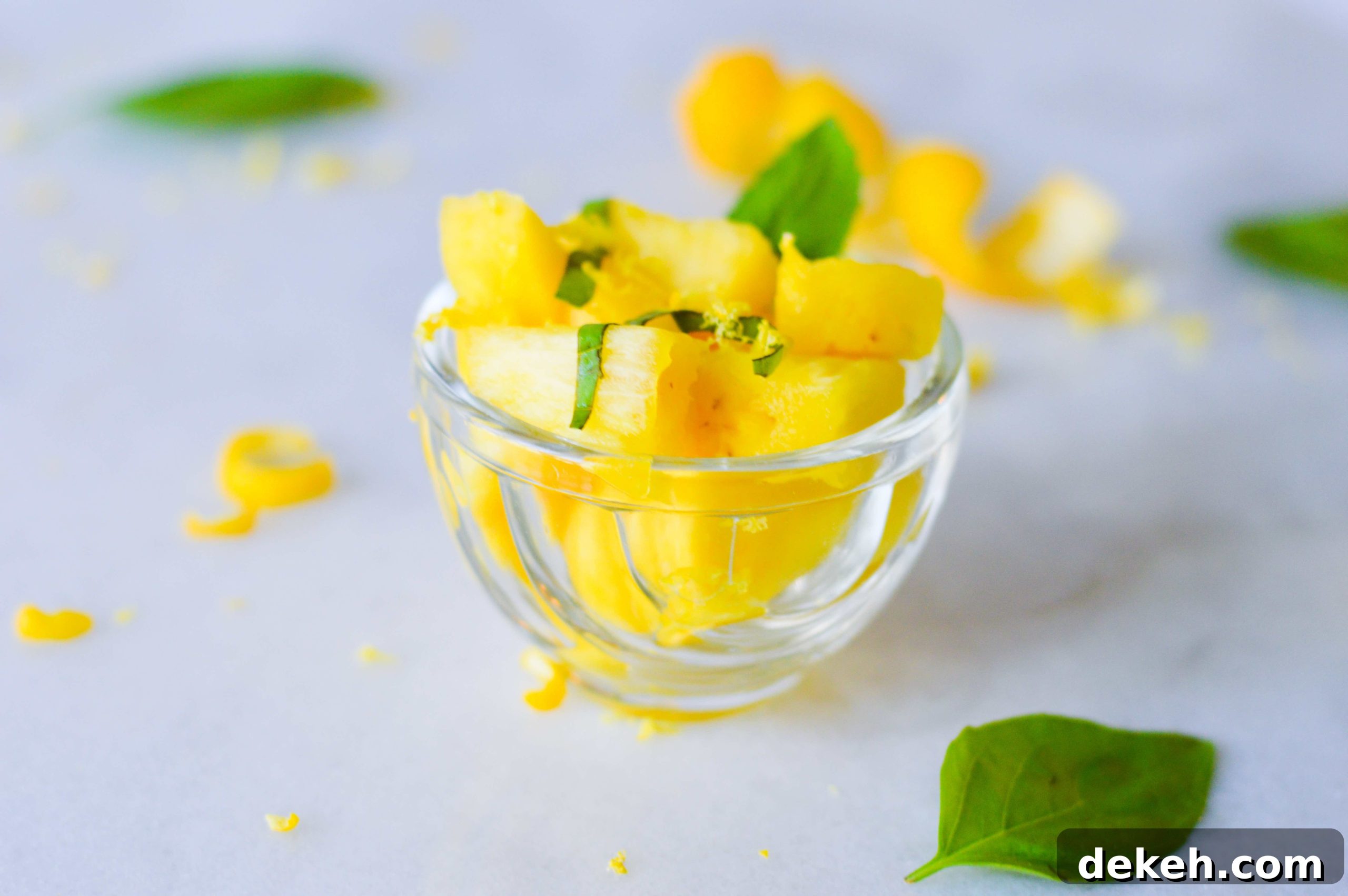 Fresh pineapple salad with basil and lemon