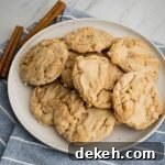 Glazed cookies on a white plate.