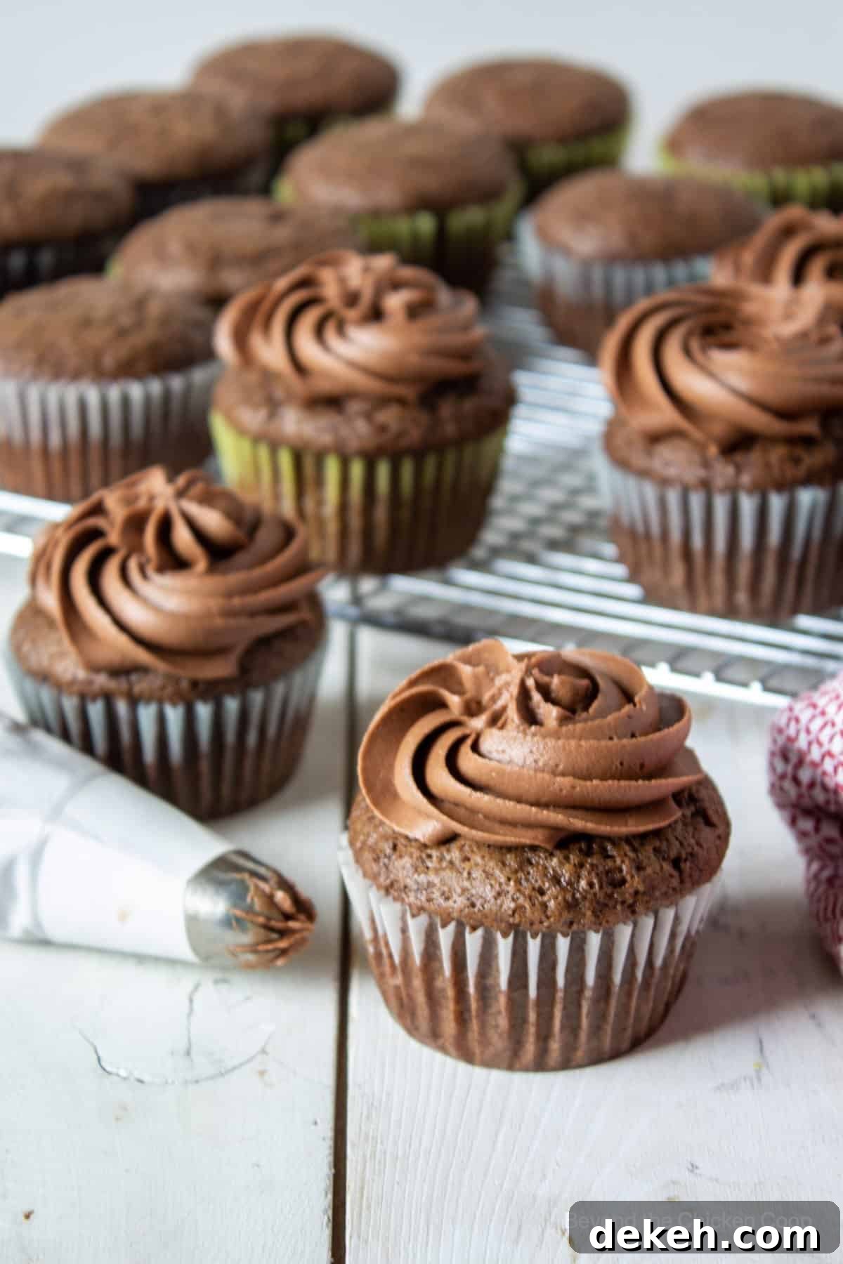 Decorating chocolate cupcakes. 