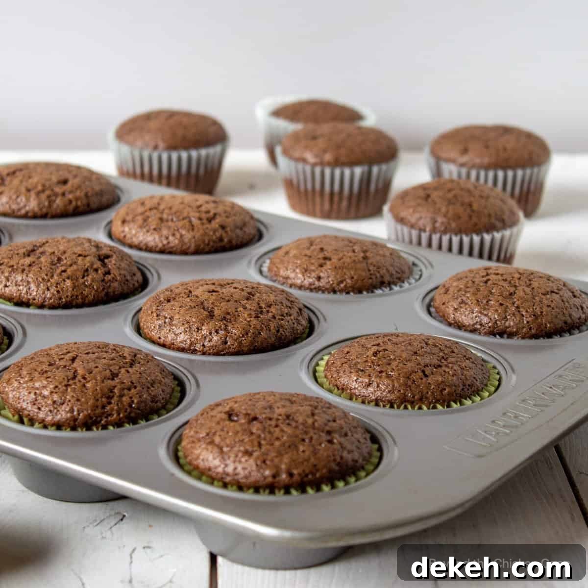 Chocolate cupcakes in a muffin tin. 