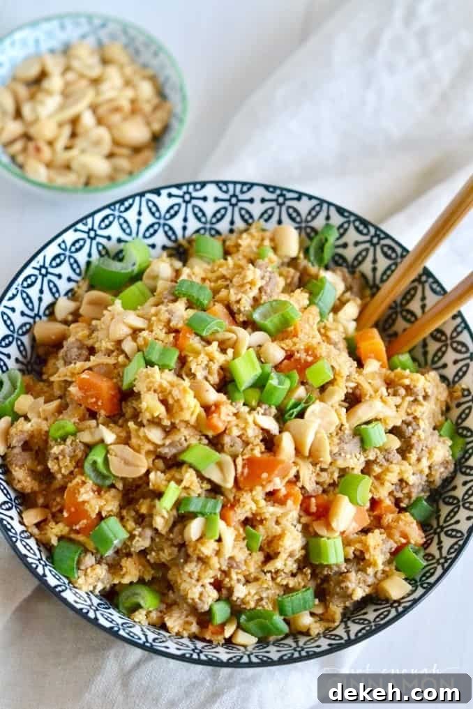 Asian cauliflower fried rice served in a Chinese noodle bowl