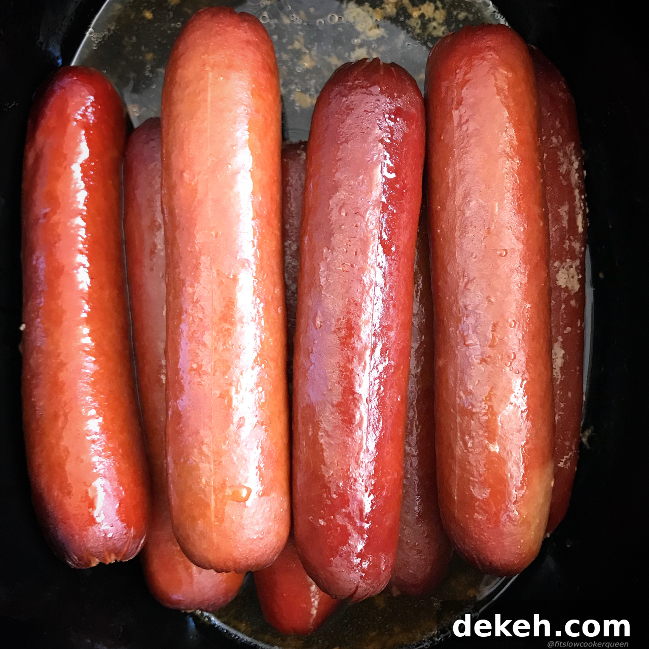 If you love steamed, 'ballpark' style hot dogs then throw them in your slow cooker! Perfect for feeding a crowd, this 1-ingredient recipe couldn't get any easier.