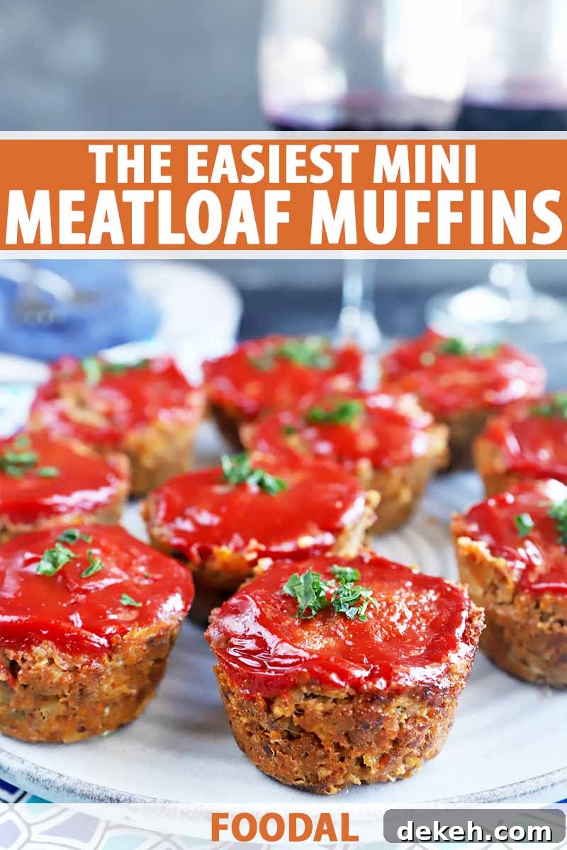 Vertical image of mini ground beef appetizers topped with a ketchup glaze and herbs on a plate, with text on the top and bottom of the image.