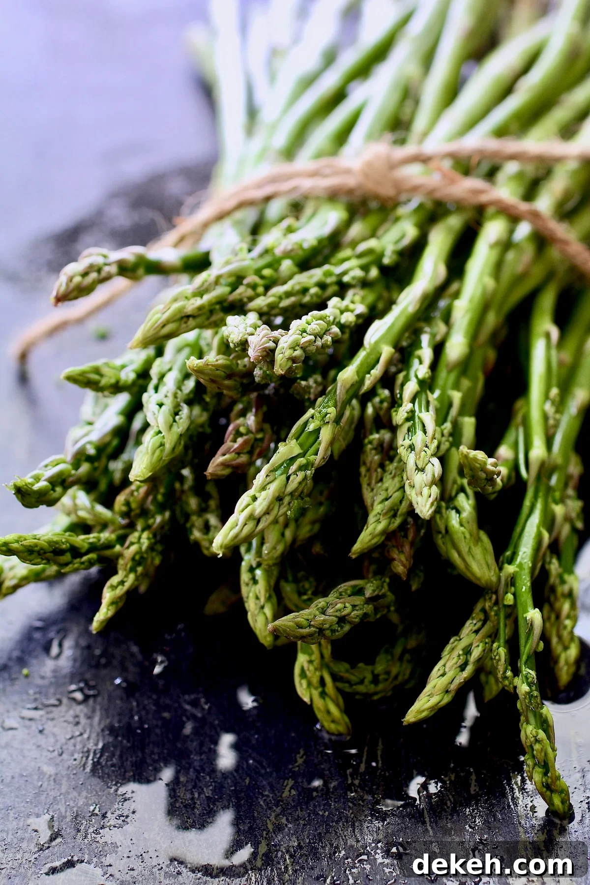 Bunch of asparagus tied with twine.