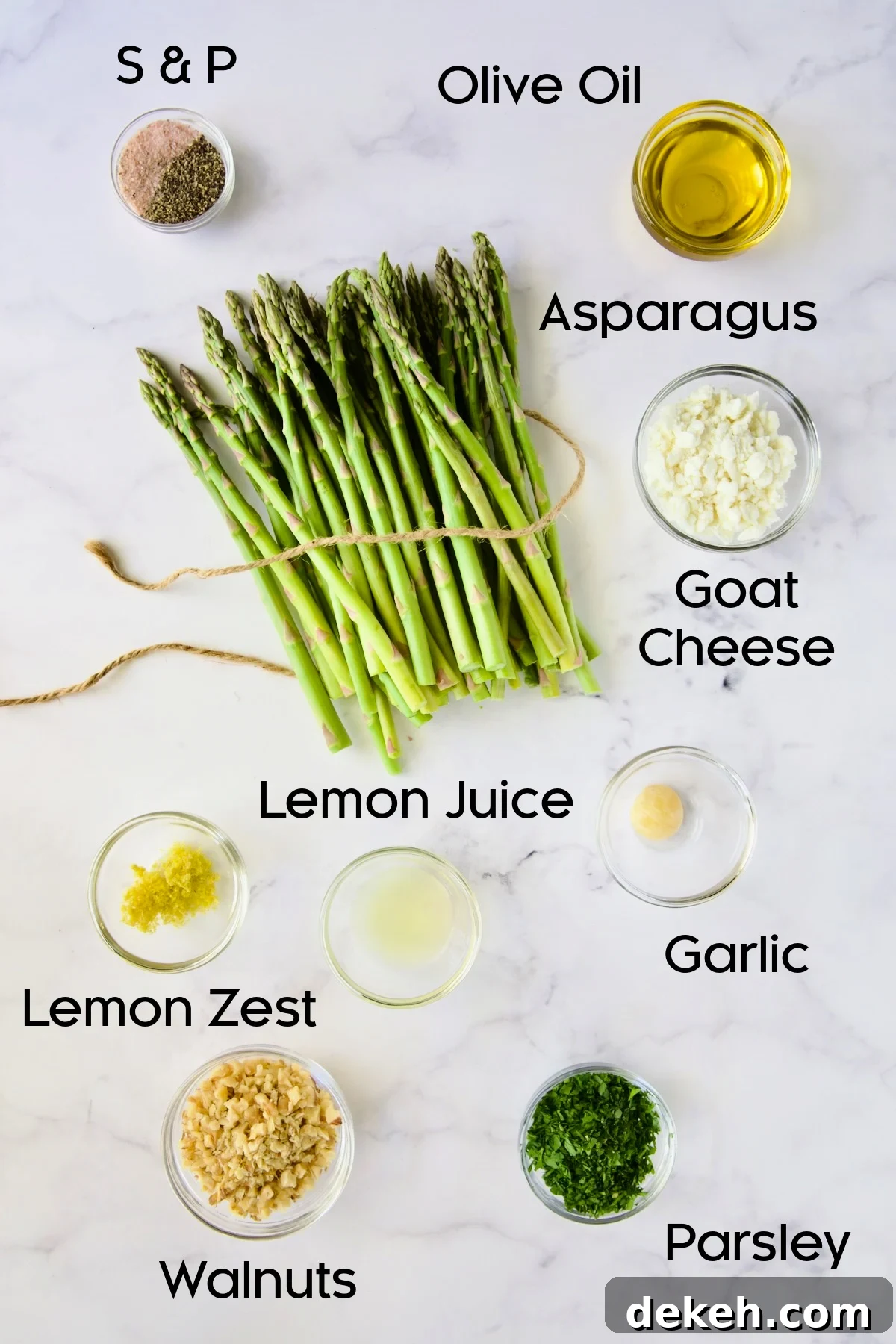 Ingredients for Roasted Asparagus with Walnut Lemon Gremolata and Goat Cheese in glass bowls.