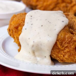 Southern Country Gravy Recipe for Biscuits and Breakfast Plates 11 Southern Country Gravy over fried chicken