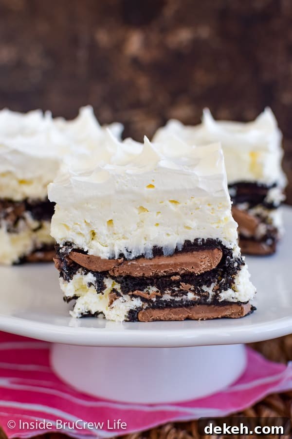 Coconut Oreo Icebox Cake - adding chocolate filled Oreos and a no bake coconut cheesecake to this easy icebox cake makes it delicious! Great recipe for summer! #iceboxcake #coconut #Oreo #nobake Coconut Oreo Icebox Cake - adding chocolate filled Oreos and a no bake coconut cheesecake to this easy icebox cake makes it delicious! Great recipe for summer! #iceboxcake #coconut #Oreo #nobake