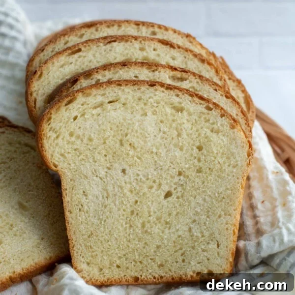 Replace Commercial Yeast with a Sourdough Starter 5 Slices of soft sourdough sandwich bread sitting together in a basket.