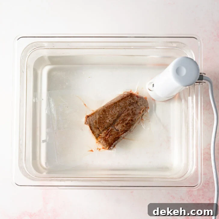 How to Reheat Steak: Stovetop, Oven & Sous Vide Methods 3 Reheating steak in sous vide water bath