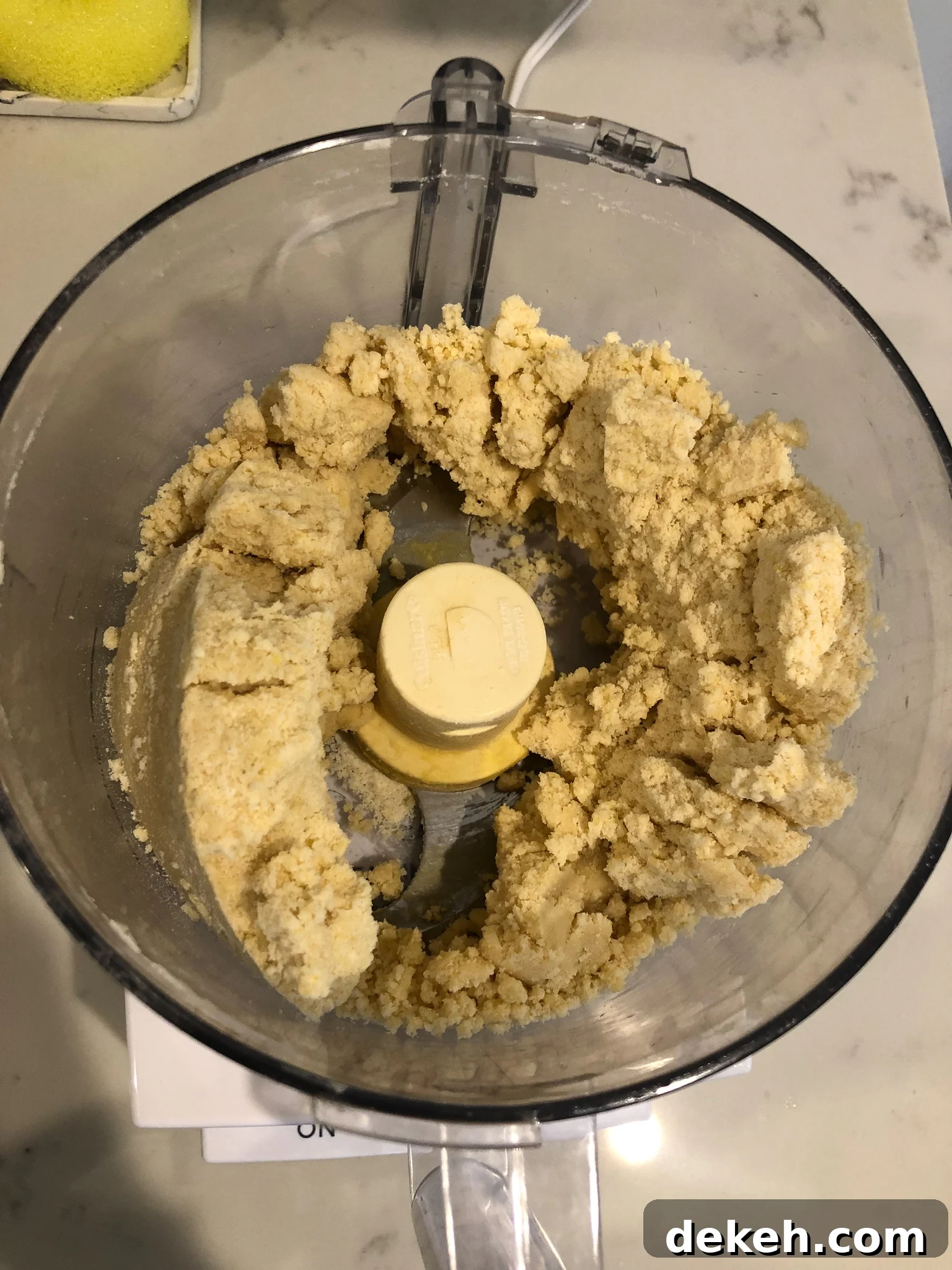 Dough coming together in the food processor.