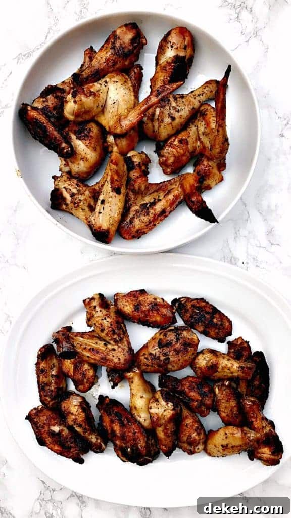 Simple BBQ Chicken Marinade Recipe for Grilled Chicken 6 grilled bbq chicken wings in a large white bowl