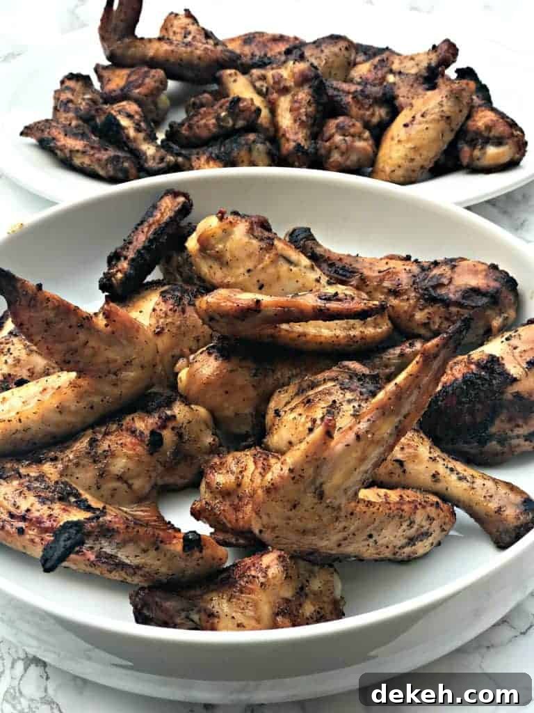 Simple BBQ Chicken Marinade Recipe for Grilled Chicken 7 grilled bbq chicken wings in a large white bowl