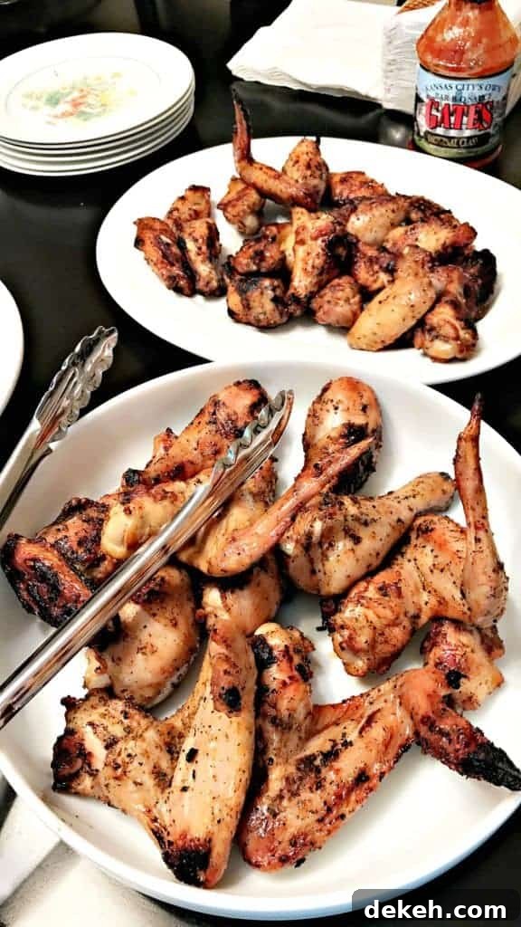 Simple BBQ Chicken Marinade Recipe for Grilled Chicken 8 grilled bbq chicken wings in a large white bowl