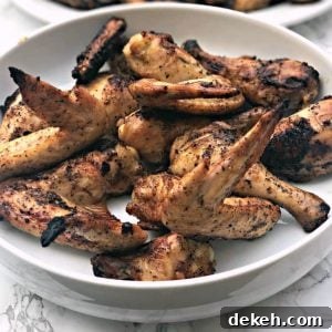 Simple BBQ Chicken Marinade Recipe for Grilled Chicken 10 grilled bbq chicken wings in a large white bowl