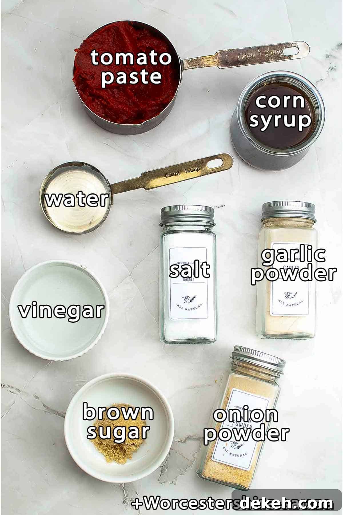 Homemade Tomato Ketchup Recipe from Scratch 3 Overhead shot of ingredients - tomato paste, corn syrup, water, vinegar, Worcestershire sauce, brown sugar, salt, garlic powder, and onion powder.