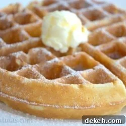Crispy Belgian Waffles Recipe: Golden, Crunchy Morning Waffles 2 Whole Crispy Waffle on Plate with Butter and Maple Syrup