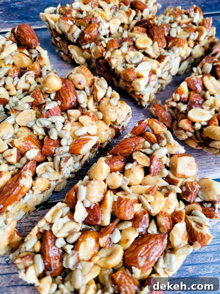 Crunchy Homemade Nut Bars: Step-by-Step Recipe 2 Close-up of homemade almond crunch bars showing crunchy nuts and golden binding.