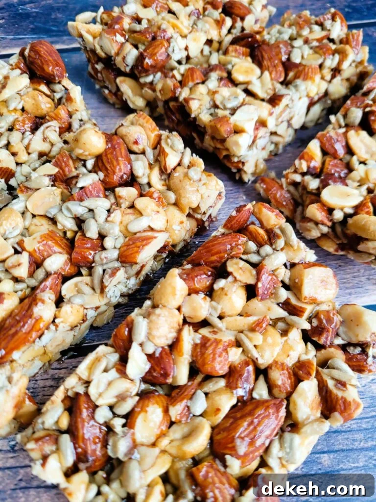 Crunchy Homemade Nut Bars: Step-by-Step Recipe 10 Close-up of homemade almond crunch bars showing crunchy nuts and golden binding.
