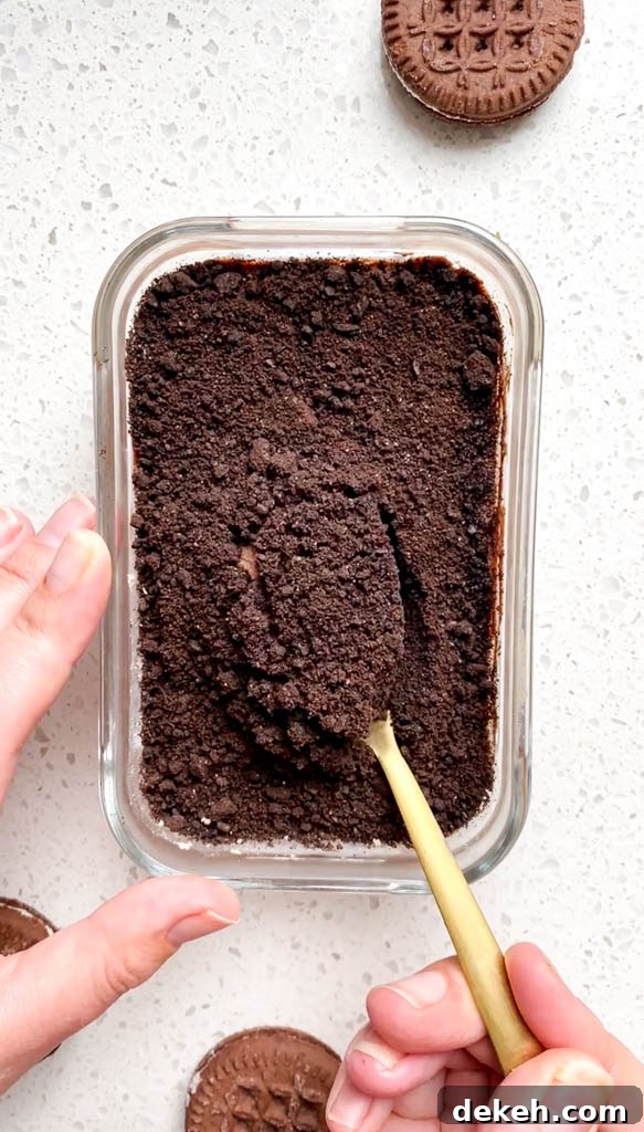 Oreo Protein Overnight Oats Recipe: High-Protein Breakfast 4 oreo overnight oats in glass jar with gold spoon
