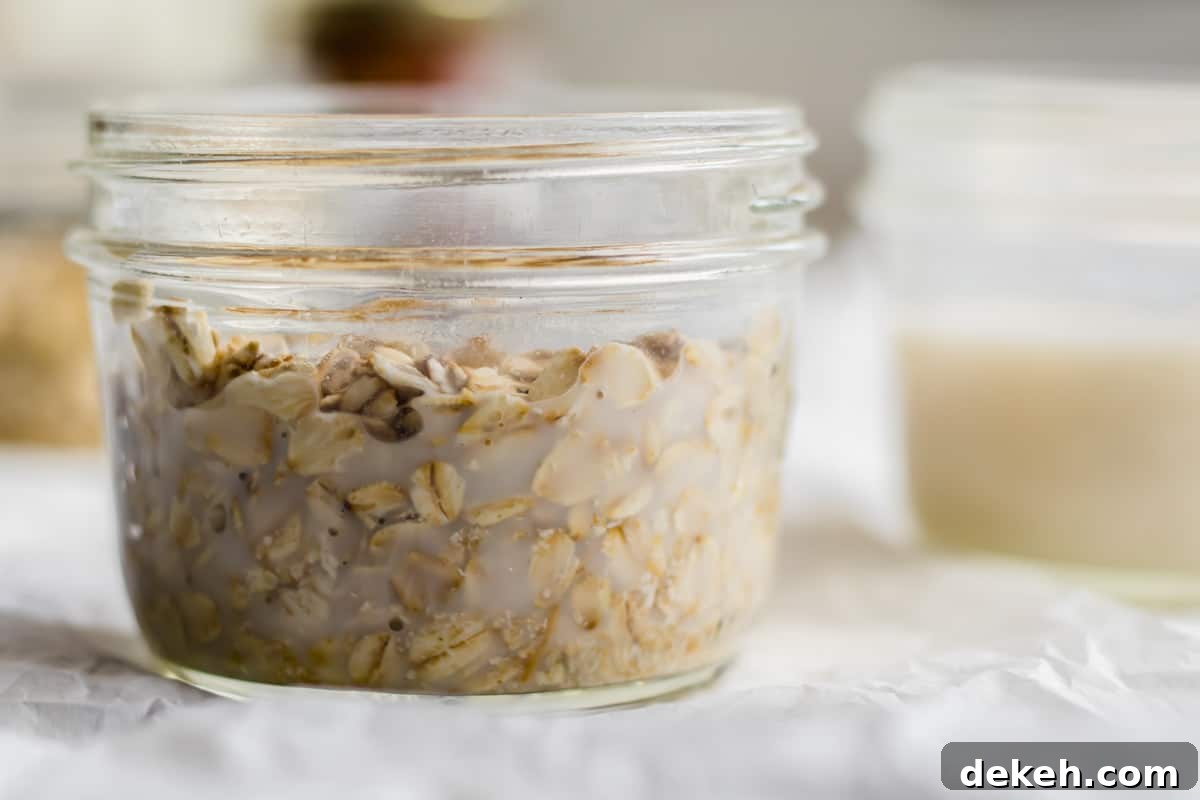 milk added to a jar of oats