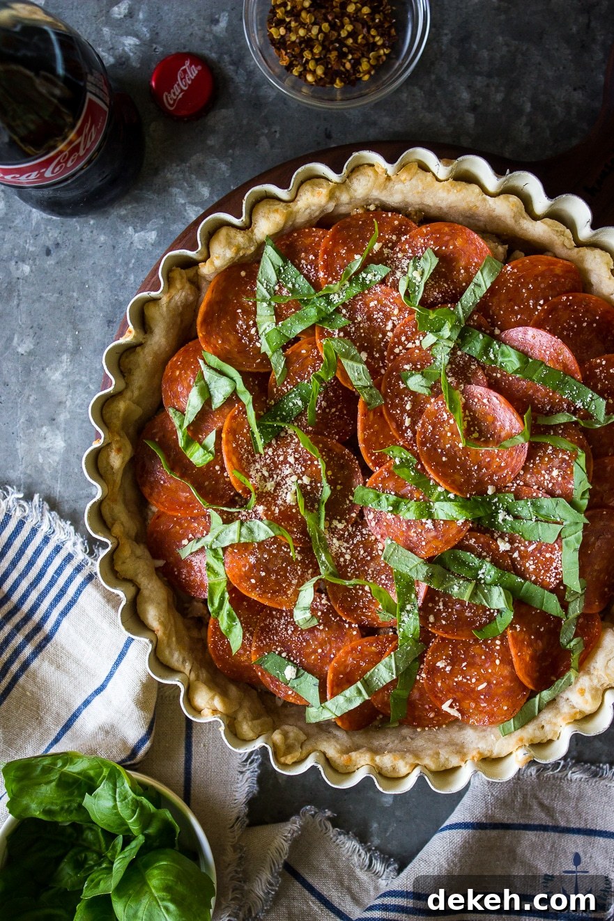 Pepperoni and Sausage Pizza Tart with Parmesan Crust Pepperoni and Sausage Pizza Tart with Parmesan Crust