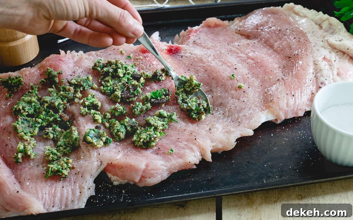Stuffed turkey roulade is an easy alternative to roasting a whole Thanksgiving turkey. Stuffed turkey roulade is an easy alternative to roasting a whole Thanksgiving turkey.