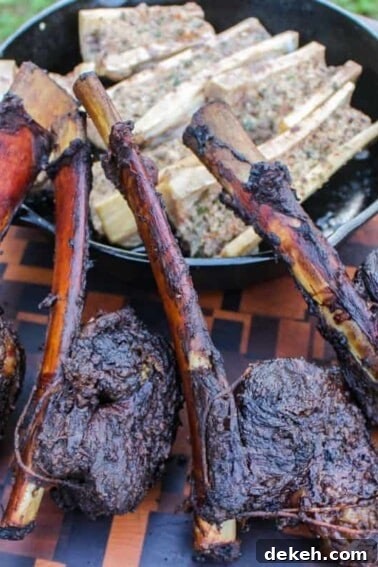 Smoked Beef Ribs with Garlic and Jalapeño 15 Tomahawk Beef Short Ribs with bone marrow plated.